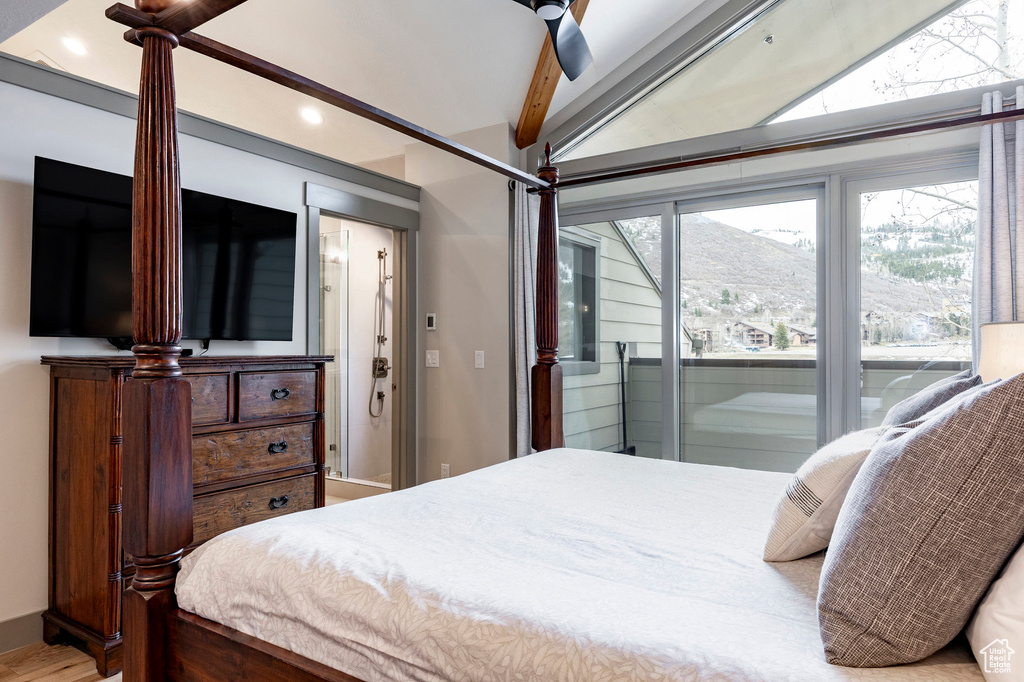 Bedroom with recessed lighting, vaulted ceiling with beams, access to outside, and multiple windows