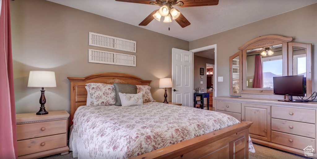 Bedroom featuring carpet and ceiling fan