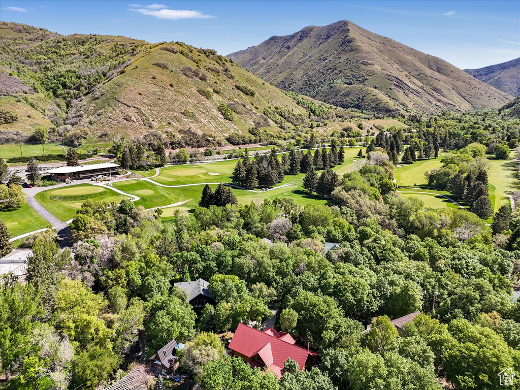 View of mountain backdrop with a golf course