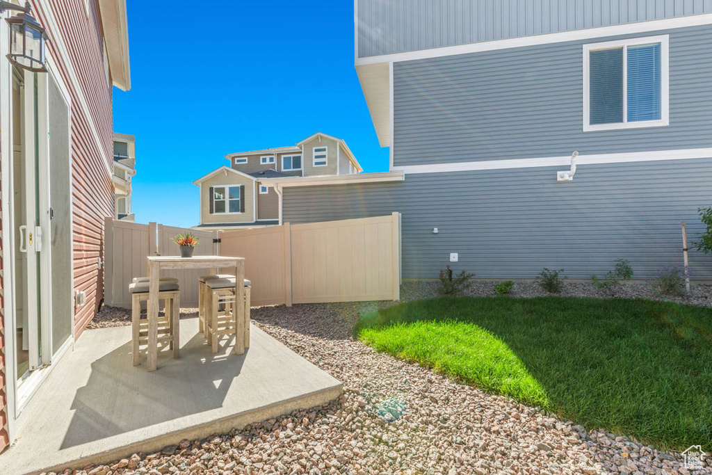 View of patio / terrace featuring fence