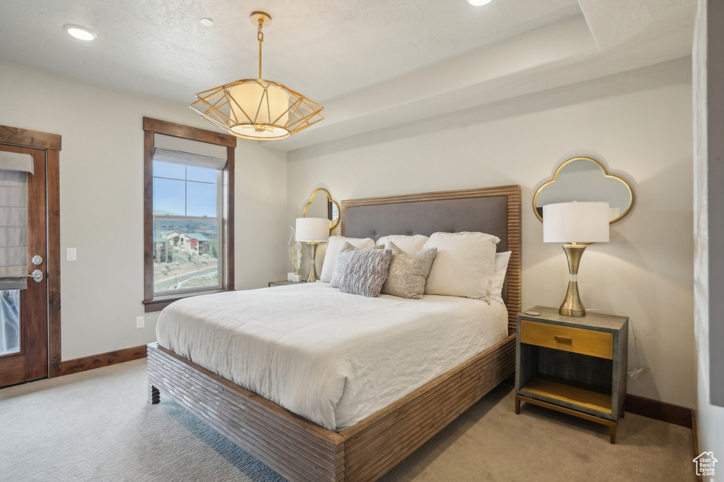 Bedroom with baseboards, recessed lighting, and carpet