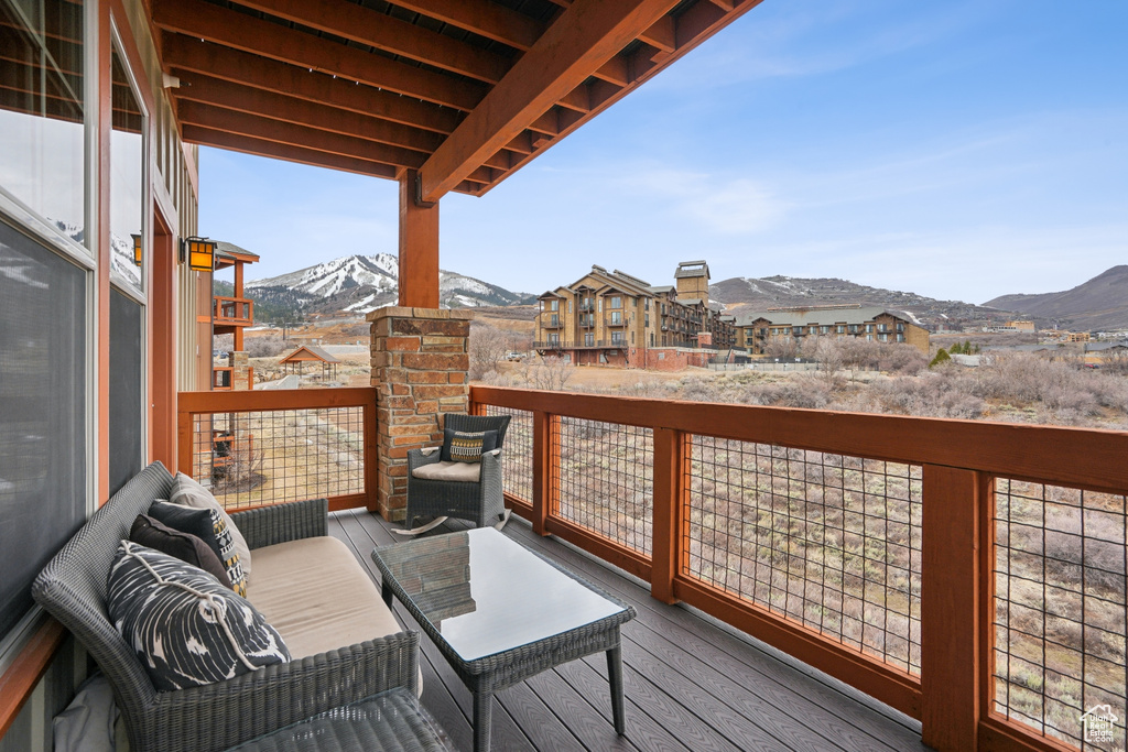 Deck featuring a mountain view