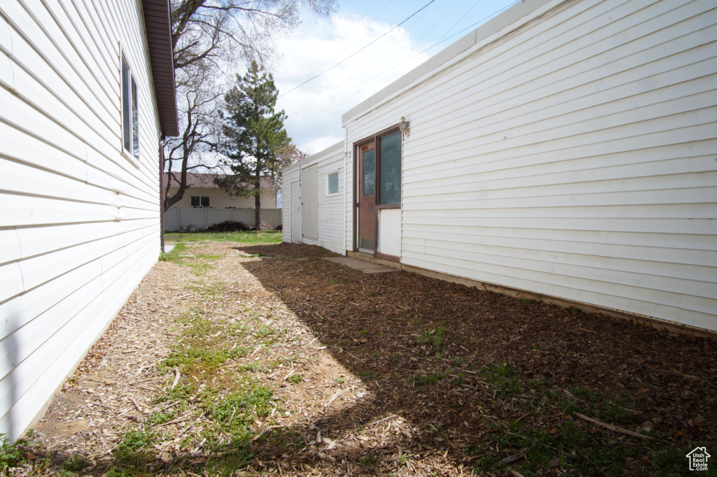 View of yard with fence