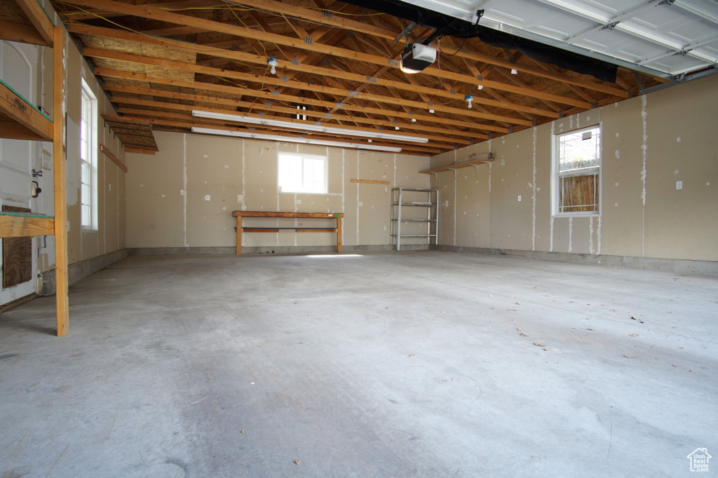 Garage featuring a garage door opener