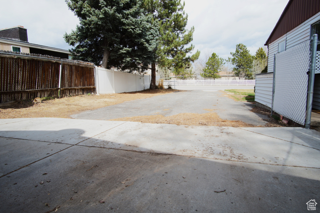 View of yard featuring fence