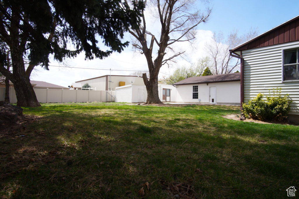 View of yard with fence