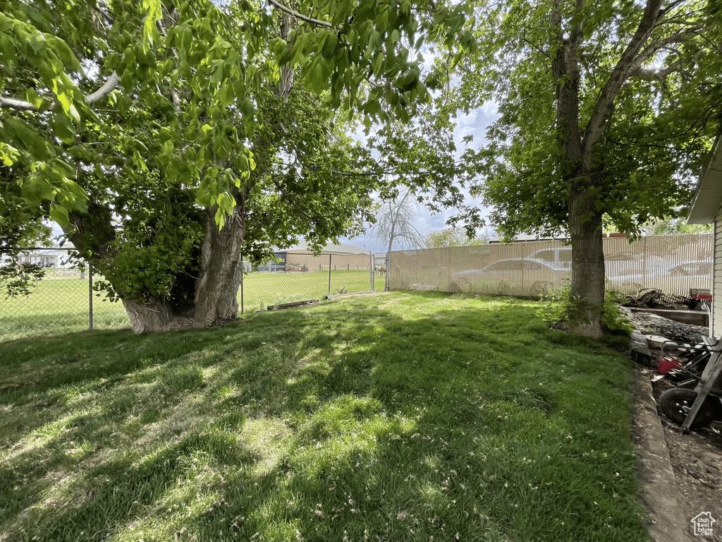 View of yard with fence