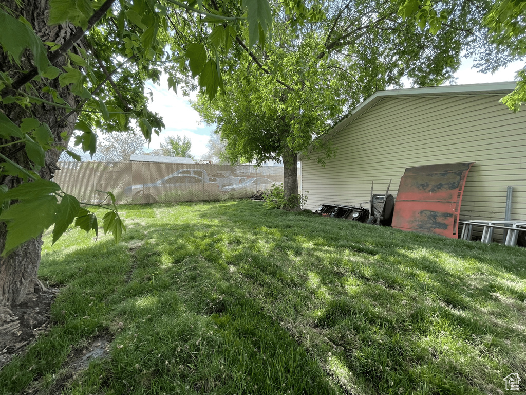 View of yard with fence