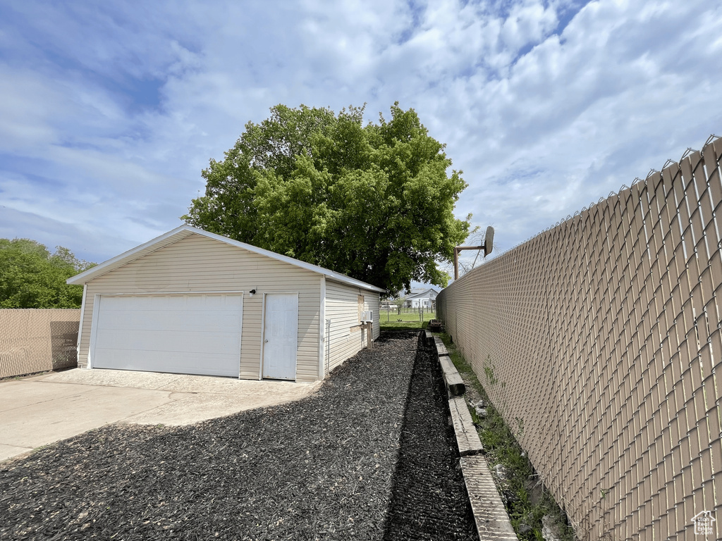 Detached garage with fence