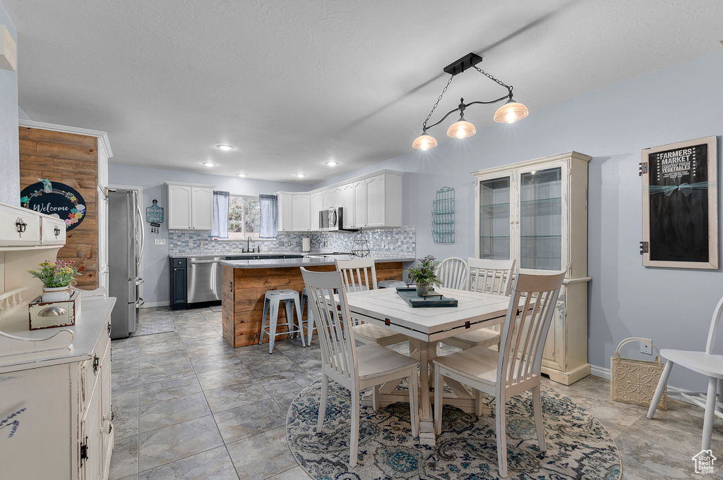 Dining space featuring baseboards