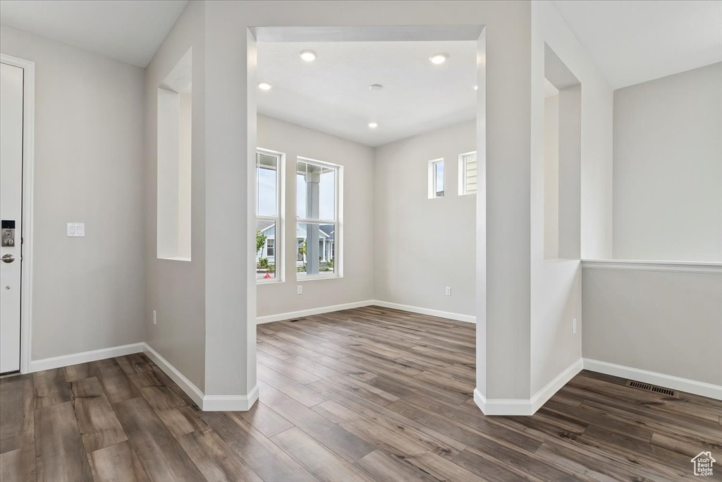 Entryway featuring recessed lighting, visible vents, baseboards, and wood finished floors