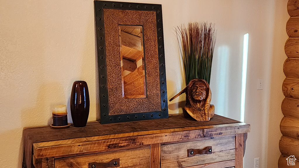 Room details featuring rustic walls