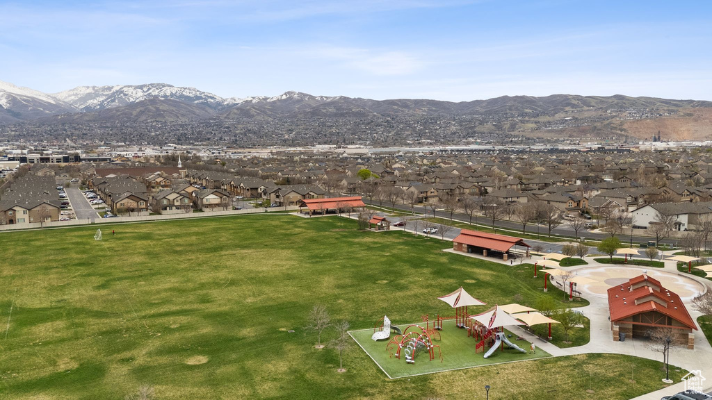 Drone / aerial view with a residential view and a mountain view