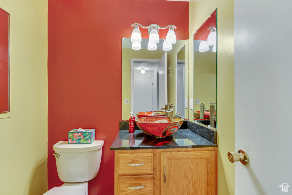 Bathroom featuring toilet and vanity