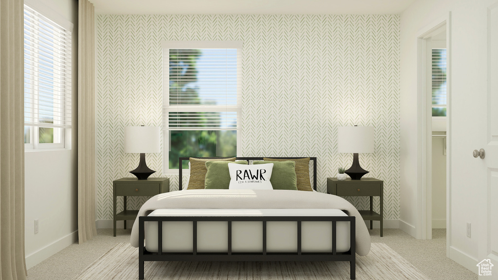 Bedroom featuring baseboards, wallpapered walls, and carpet floors