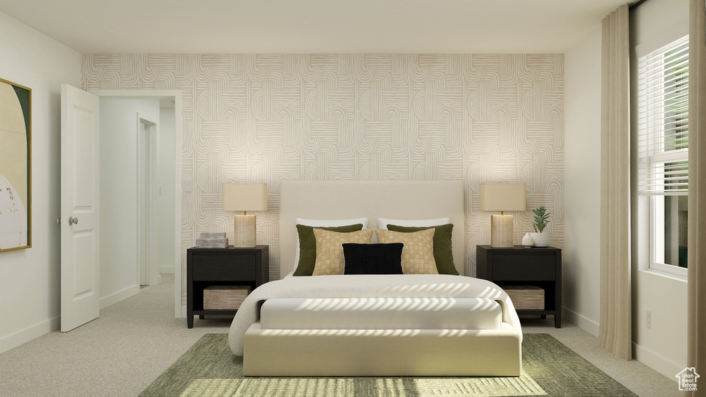 Bedroom with baseboards, wallpapered walls, and carpet