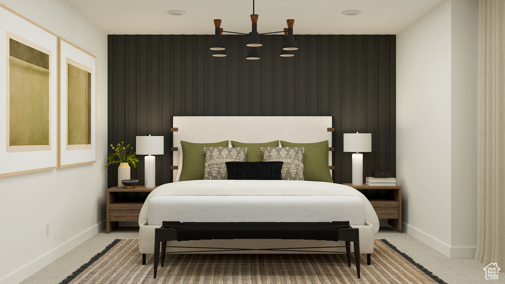 Carpeted bedroom featuring baseboards and an accent wall