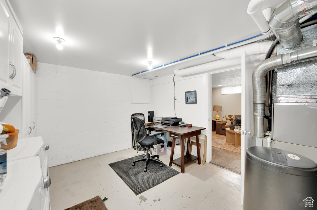 Office space featuring concrete flooring