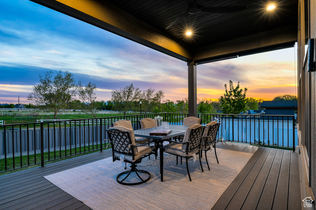 Deck featuring ceiling fan and outdoor dining area
