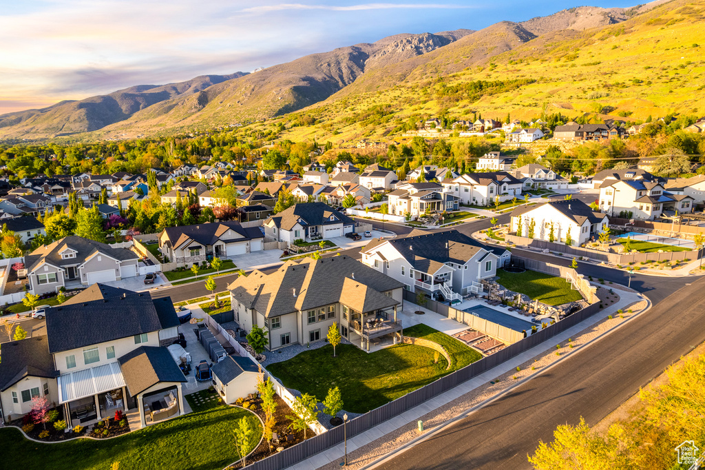 Birds eye view of property featuring a mountain view and a residential view