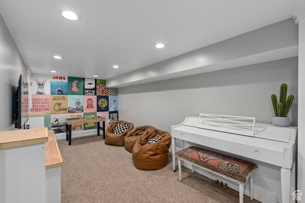 Recreation room featuring carpet floors and recessed lighting