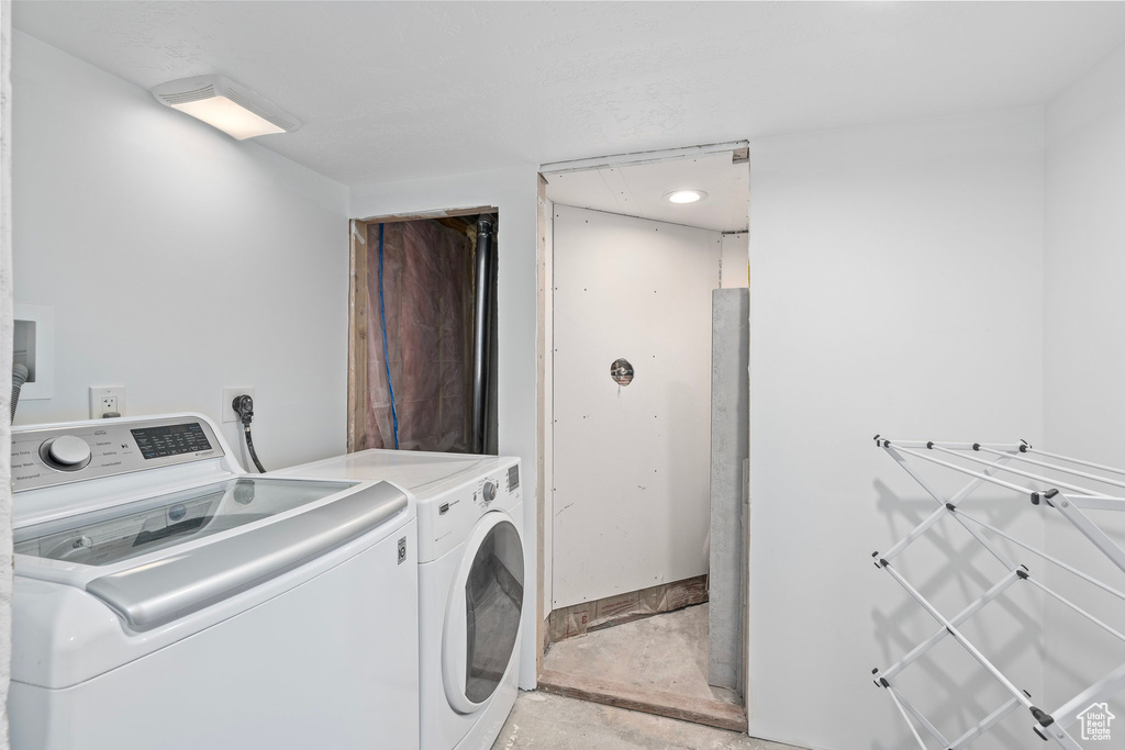 Clothes washing area with washing machine and clothes dryer and laundry area