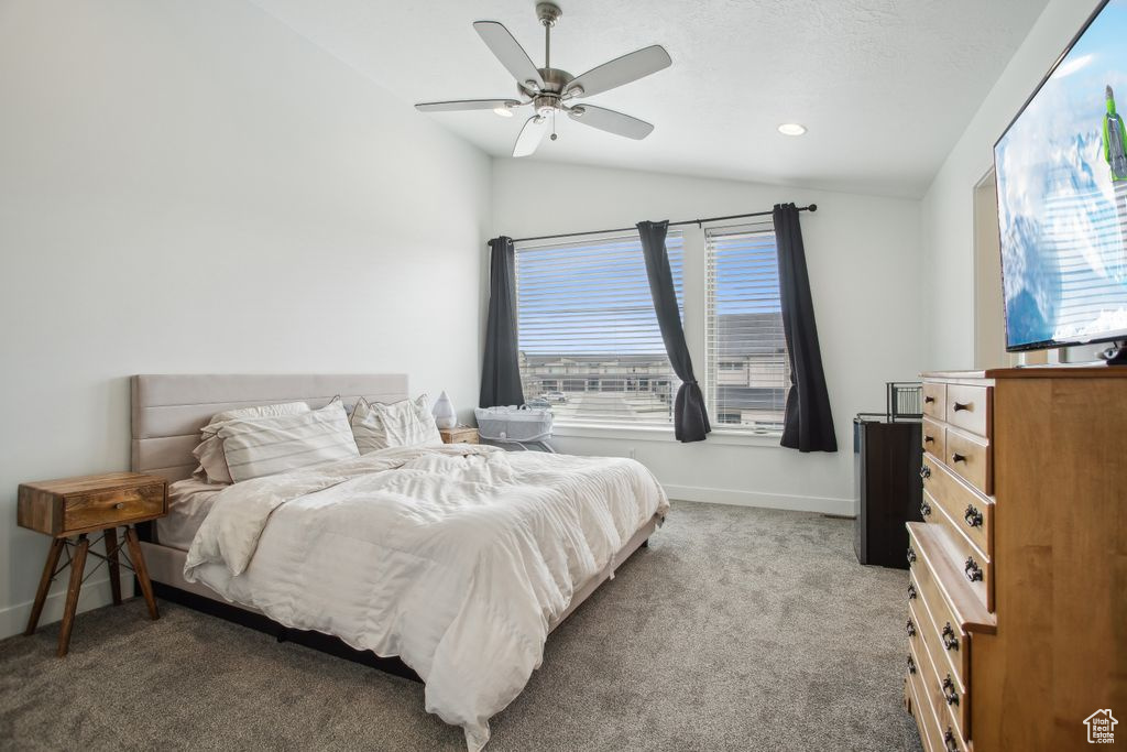 Bedroom featuring carpet flooring, baseboards, ceiling fan, recessed lighting, and lofted ceiling