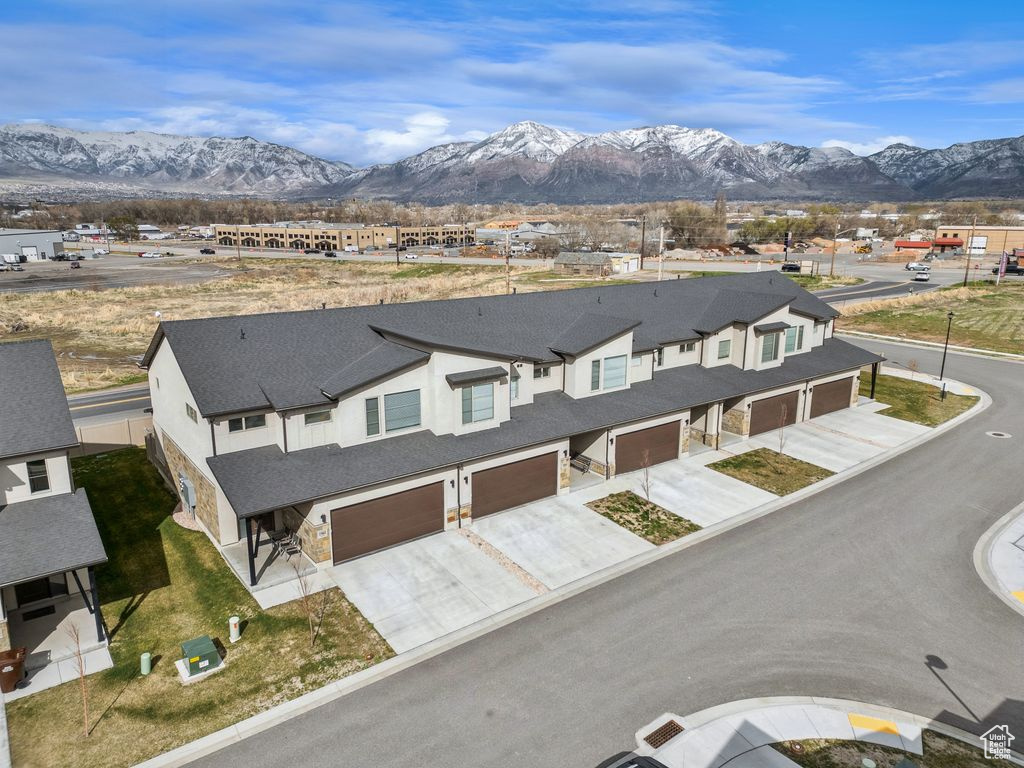 Aerial view featuring a mountain view and a residential view