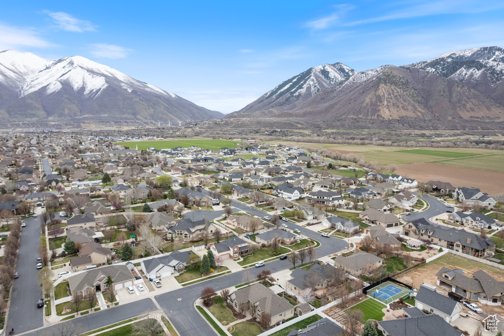 Drone / aerial view with a residential view and a mountain view