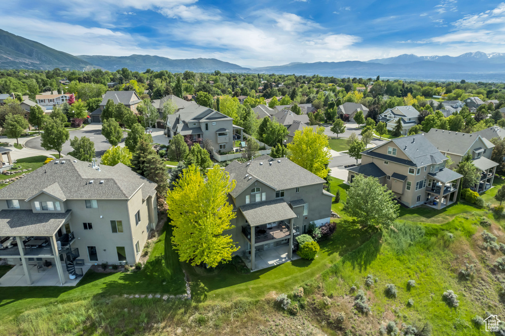 Aerial view of residential area with mountains