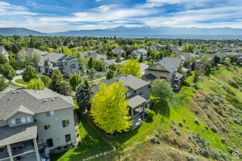 Aerial perspective of suburban area featuring mountains