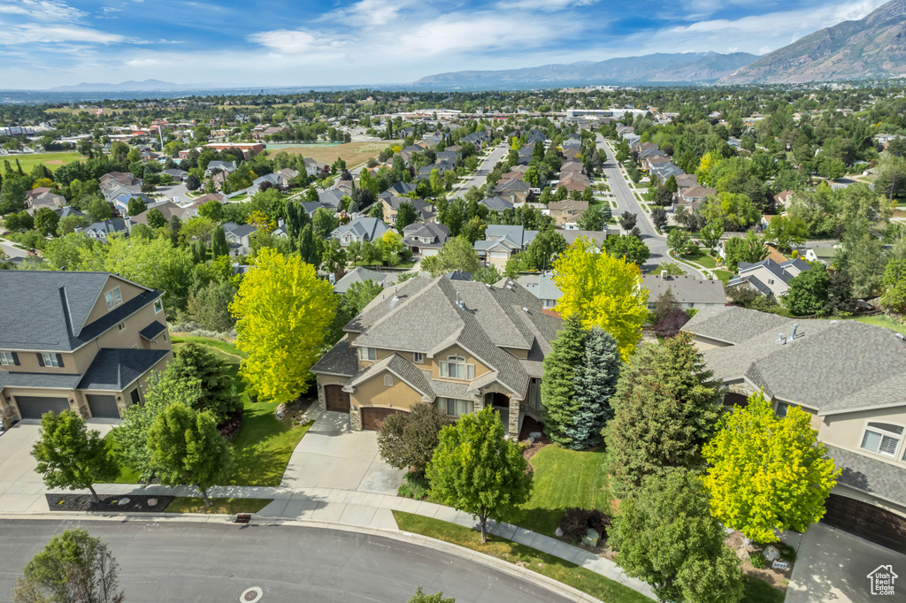 Aerial perspective of suburban area featuring mountains