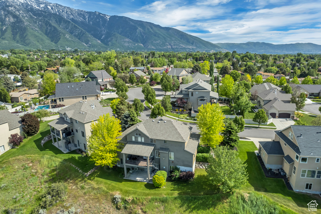Aerial view of residential area with mountains