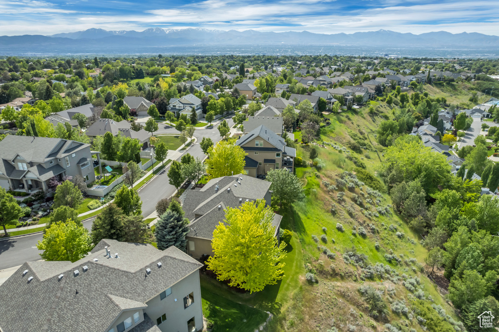Aerial view of residential area with a mountain backdrop