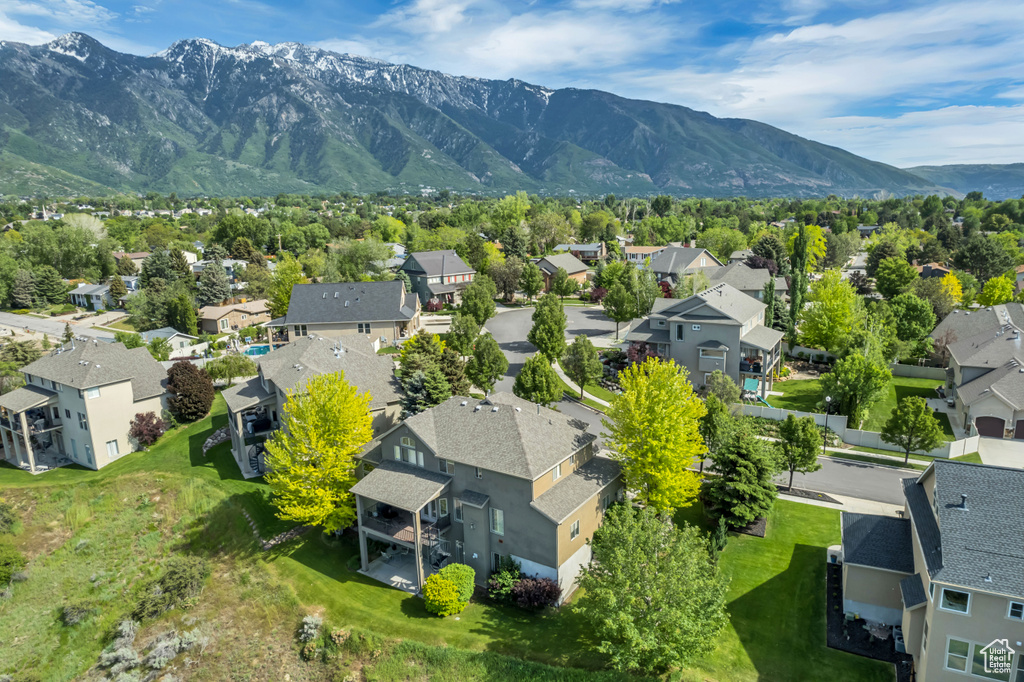 Aerial perspective of suburban area with mountains