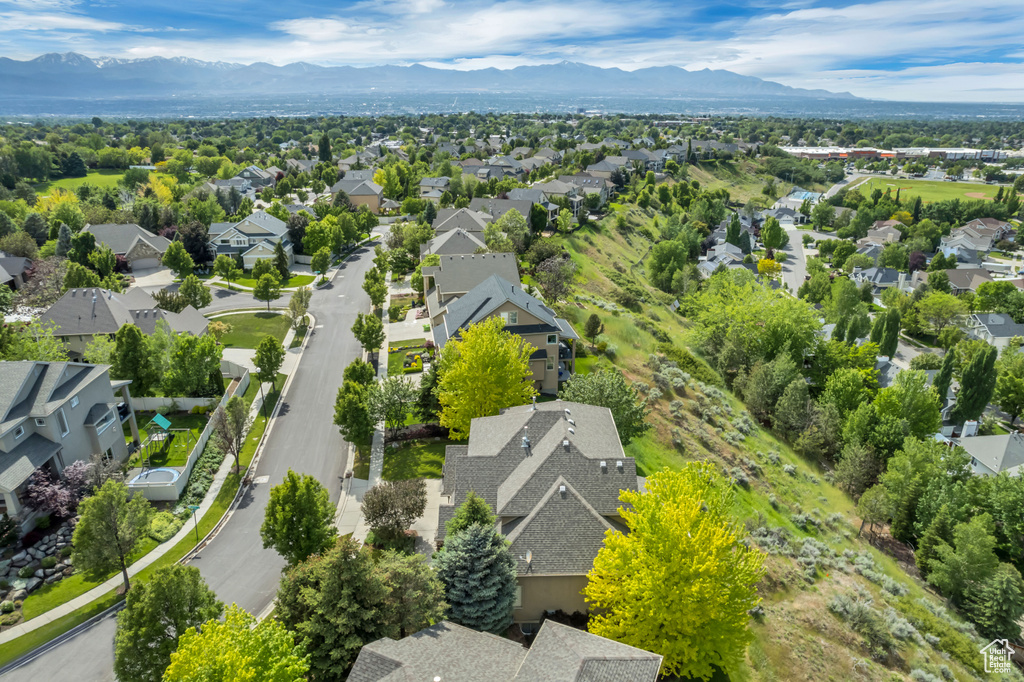 Aerial view of residential area with a mountain backdrop