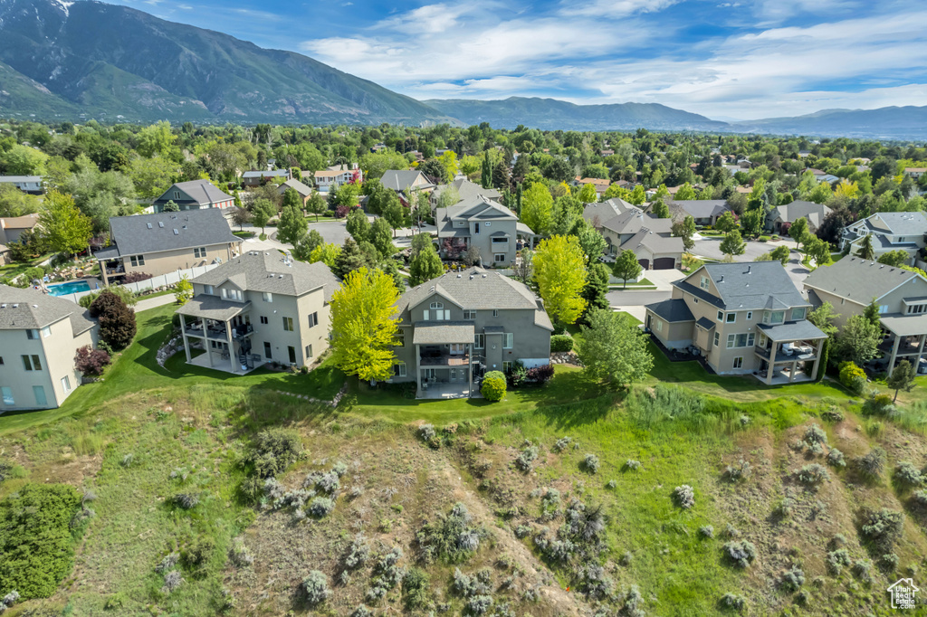 Aerial view of residential area with mountains