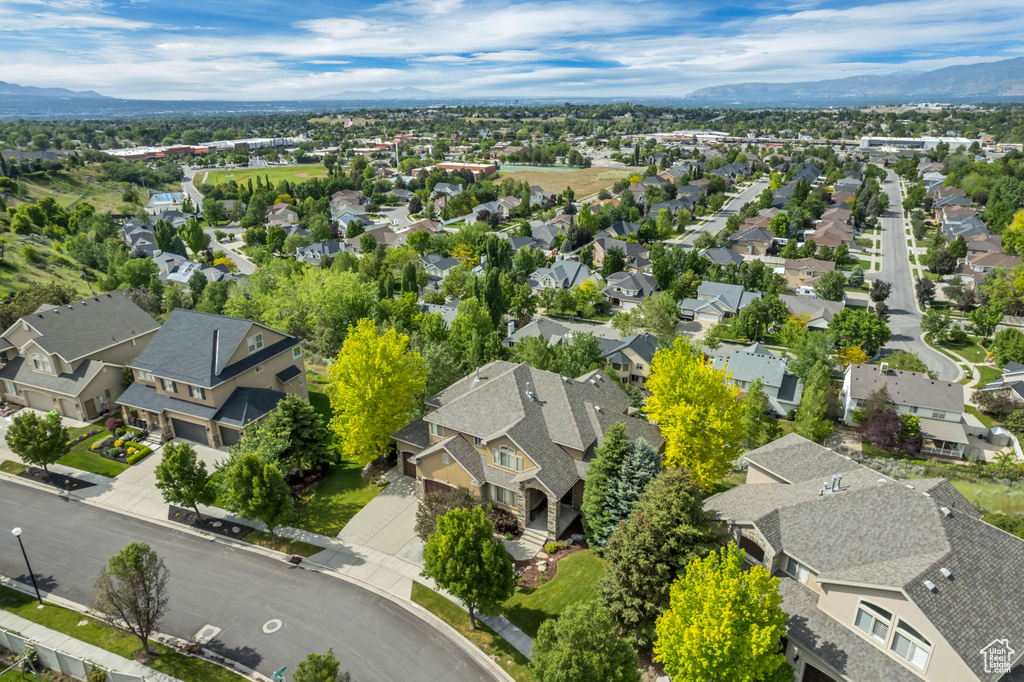 Aerial view of residential area with mountains
