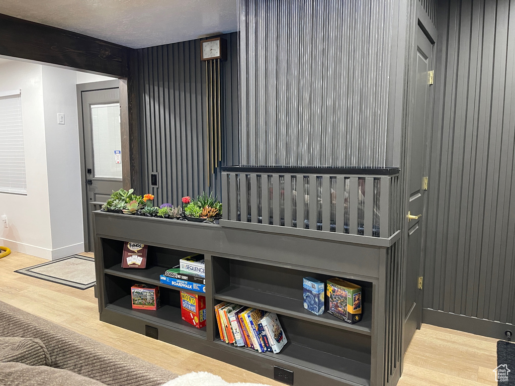 Interior details with baseboards and wood finished floors