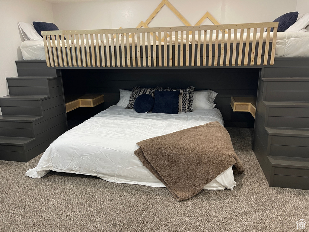 Bedroom with carpet flooring