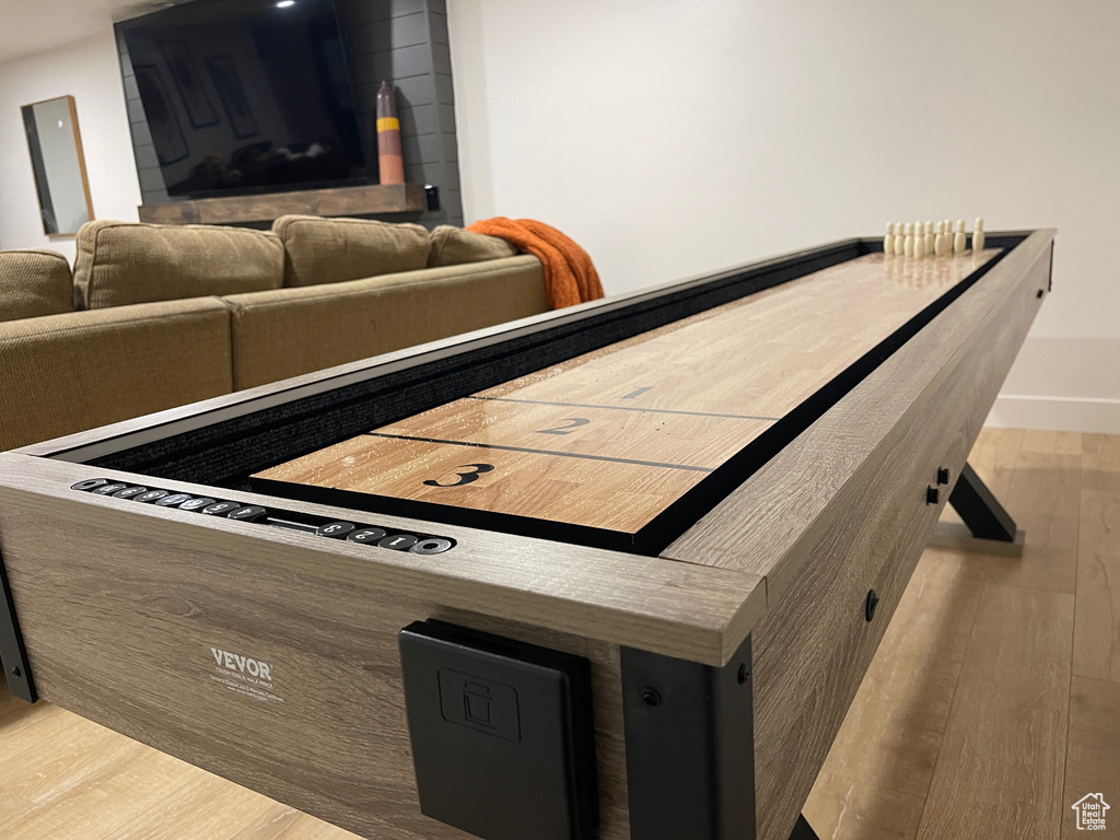 Room details featuring baseboards and wood finished floors