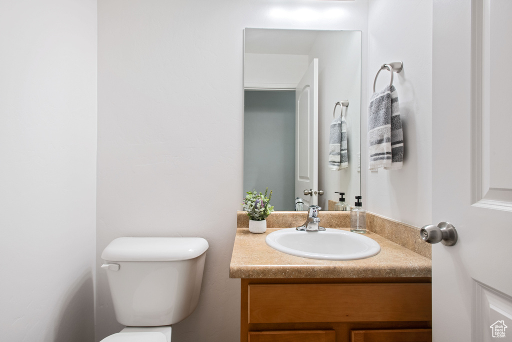 Bathroom with toilet and vanity