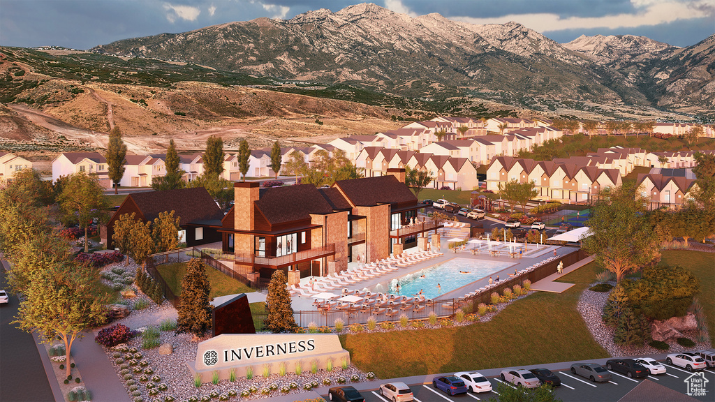 Drone / aerial view featuring a mountain view and a residential view