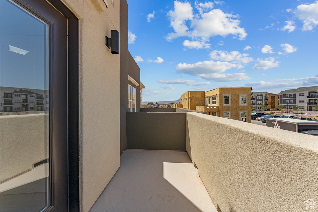 Balcony featuring a residential view