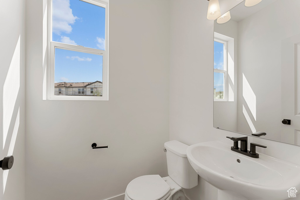 Bathroom with a sink and toilet