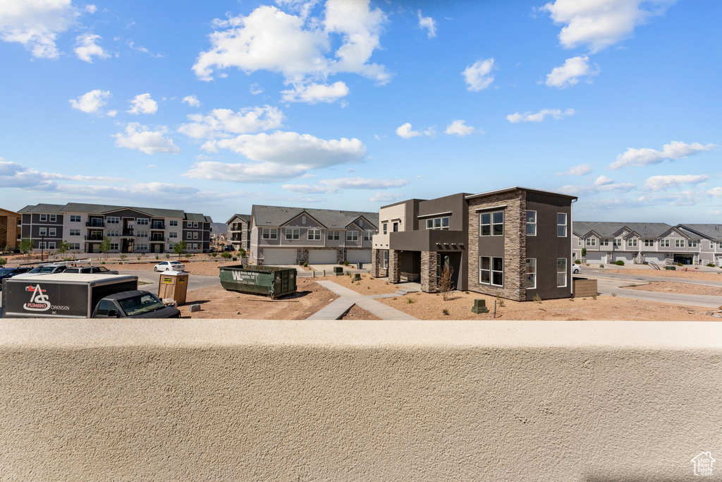 Balcony featuring a residential view