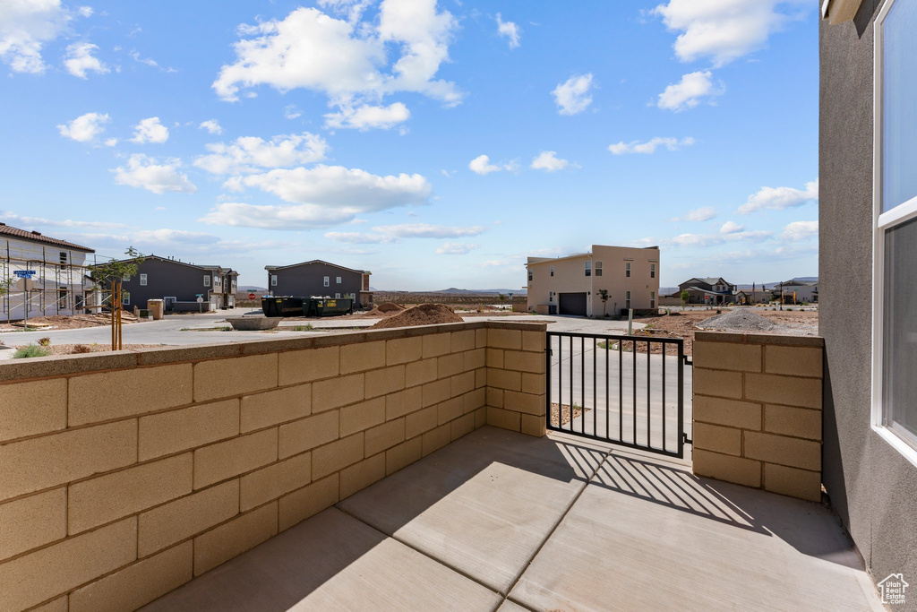 Patio / terrace featuring a residential view