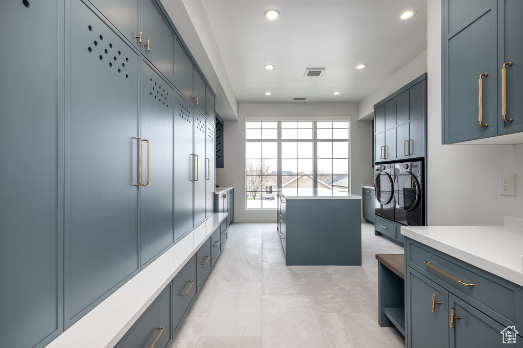 Interior space featuring visible vents, recessed lighting, and vanity