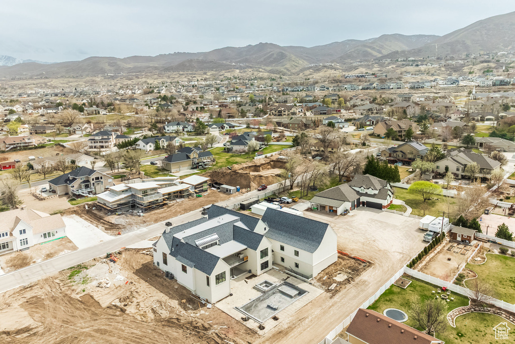 Birds eye view of property featuring a residential view and a mountain view