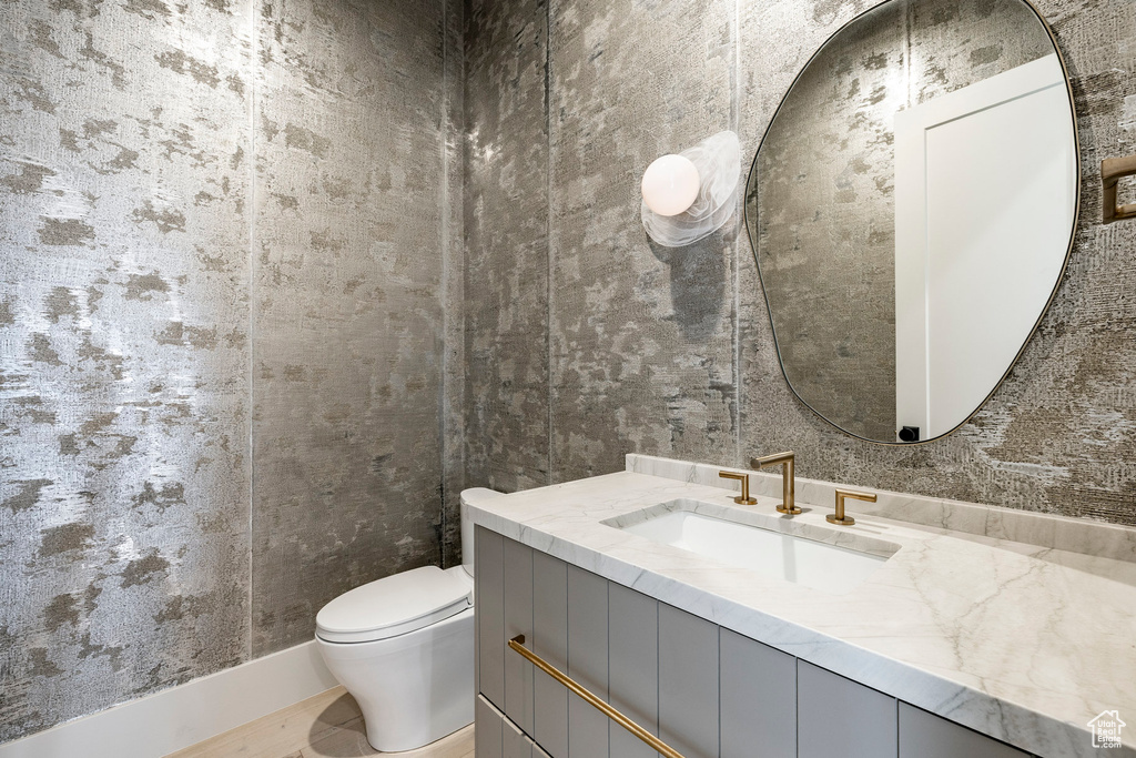 Bathroom with vanity and toilet